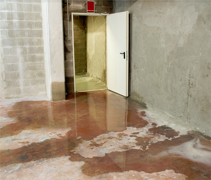 puddles of water on concrete floor