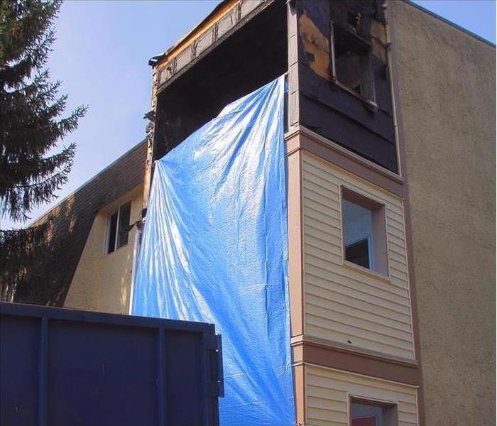 Tarp on Side Of Building