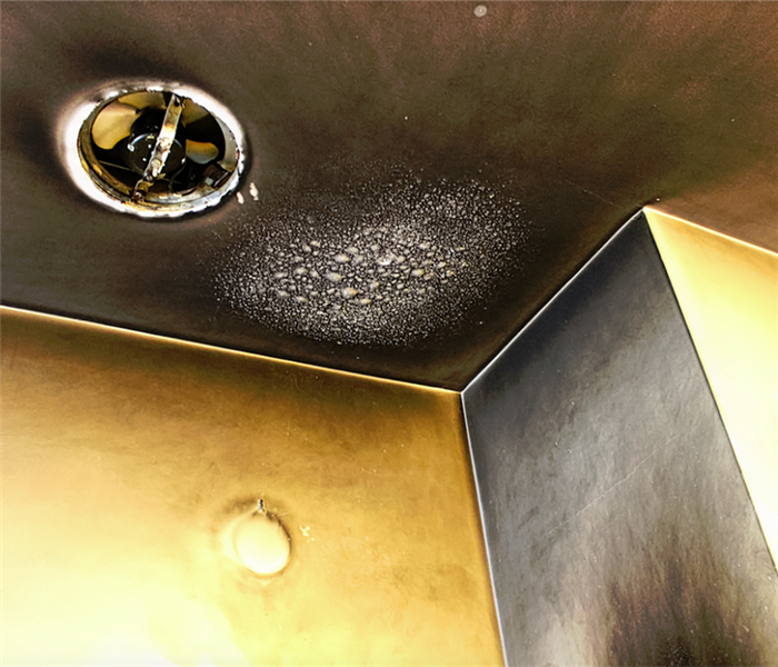 a soot covered ceiling and room